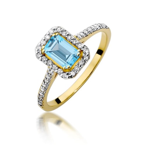 Przejdź do produktu Złoty Pierścionek z Topazem 0.65ct i Diamentami 0.19ct